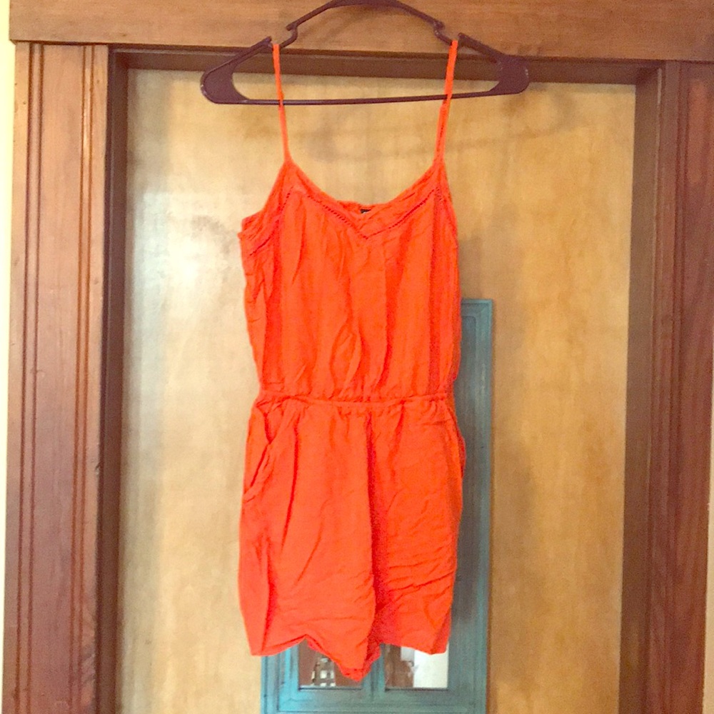 Neon coral romper.